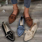 Assorted woven bow pointed toe flats in black, blue, and cream colorways