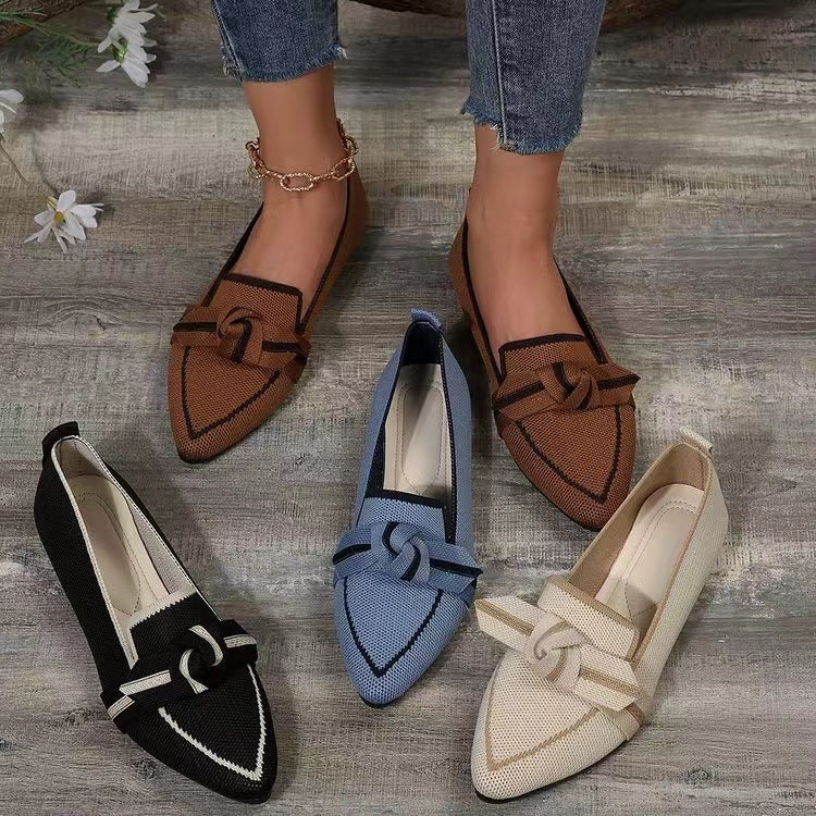 Assorted woven bow pointed toe flats in black, blue, and cream colorways