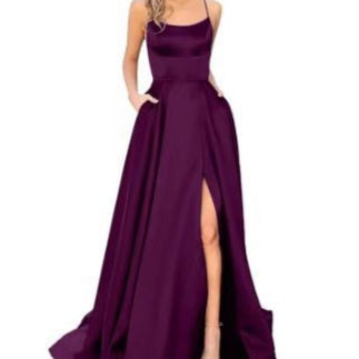 Purple sleeveless maxi dress with square neckline, fitted bodice, and front slit