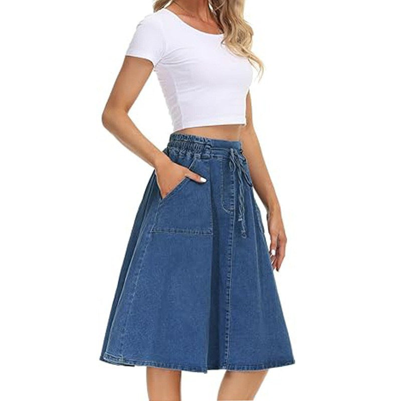 Blue denim A-line skirt with waist belt and stitched pockets