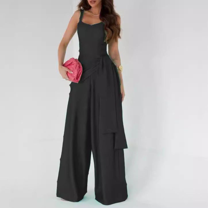 Women’s suspender-style wide-leg pants in black with spaghetti straps and cargo pockets