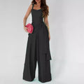 Women’s suspender-style wide-leg pants in black with spaghetti straps and cargo pockets