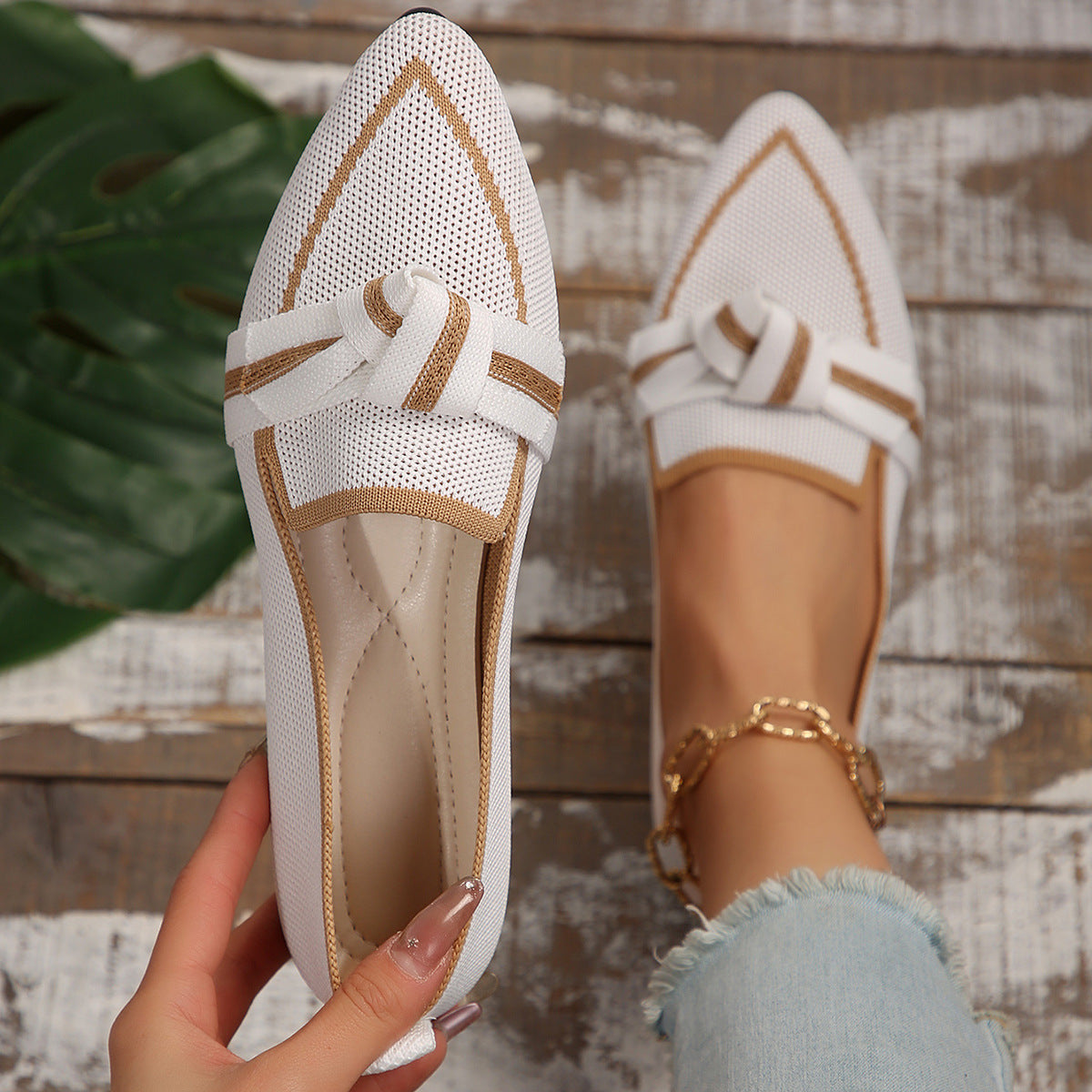 White woven bow pointed toe flats with tan trim and bow-tie strap detail