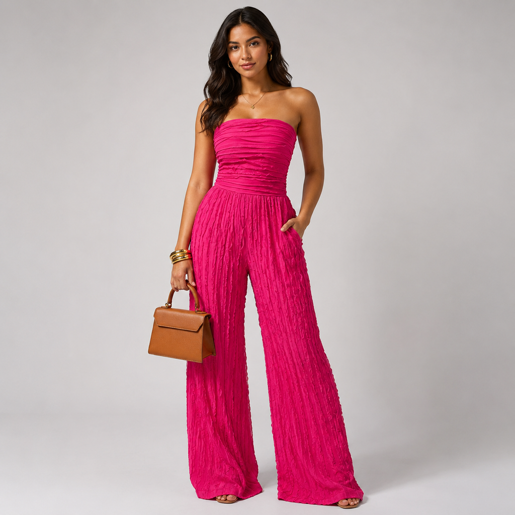 Fuchsia ruched strapless wide-leg jumpsuit with textured fabric and gathered waist