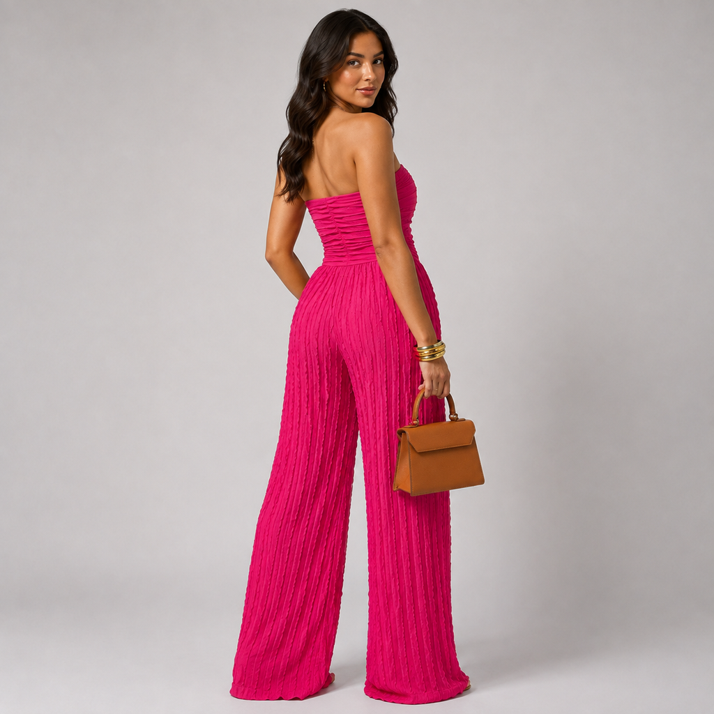 Fuchsia ruched strapless wide-leg jumpsuit with gathered front and pleated legs