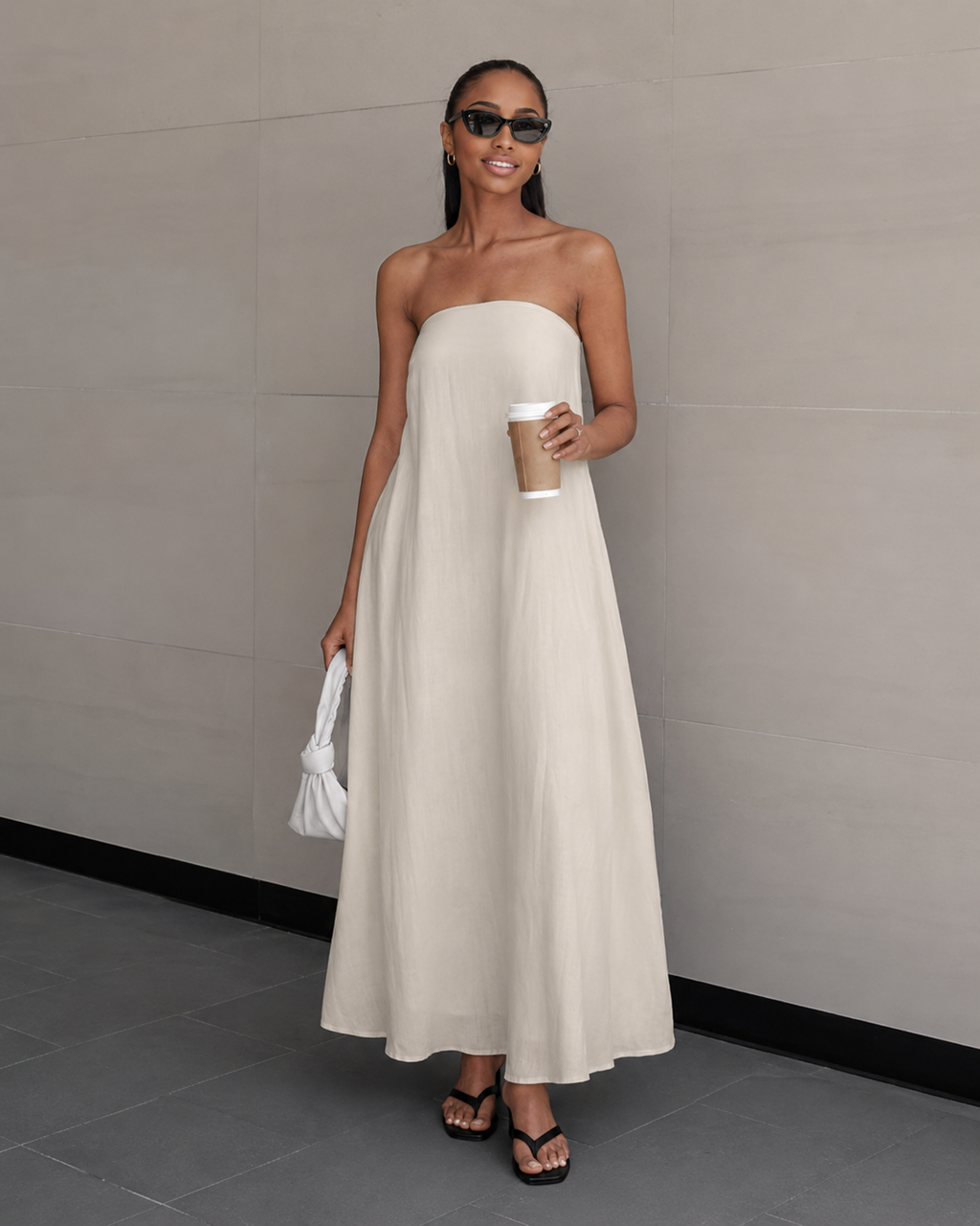 Ivory strapless flowing maxi dress, straight neckline, long skirt with gentle drape