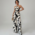 Zebra print halter suspender jumpsuit with wide-leg pants, belted waist
