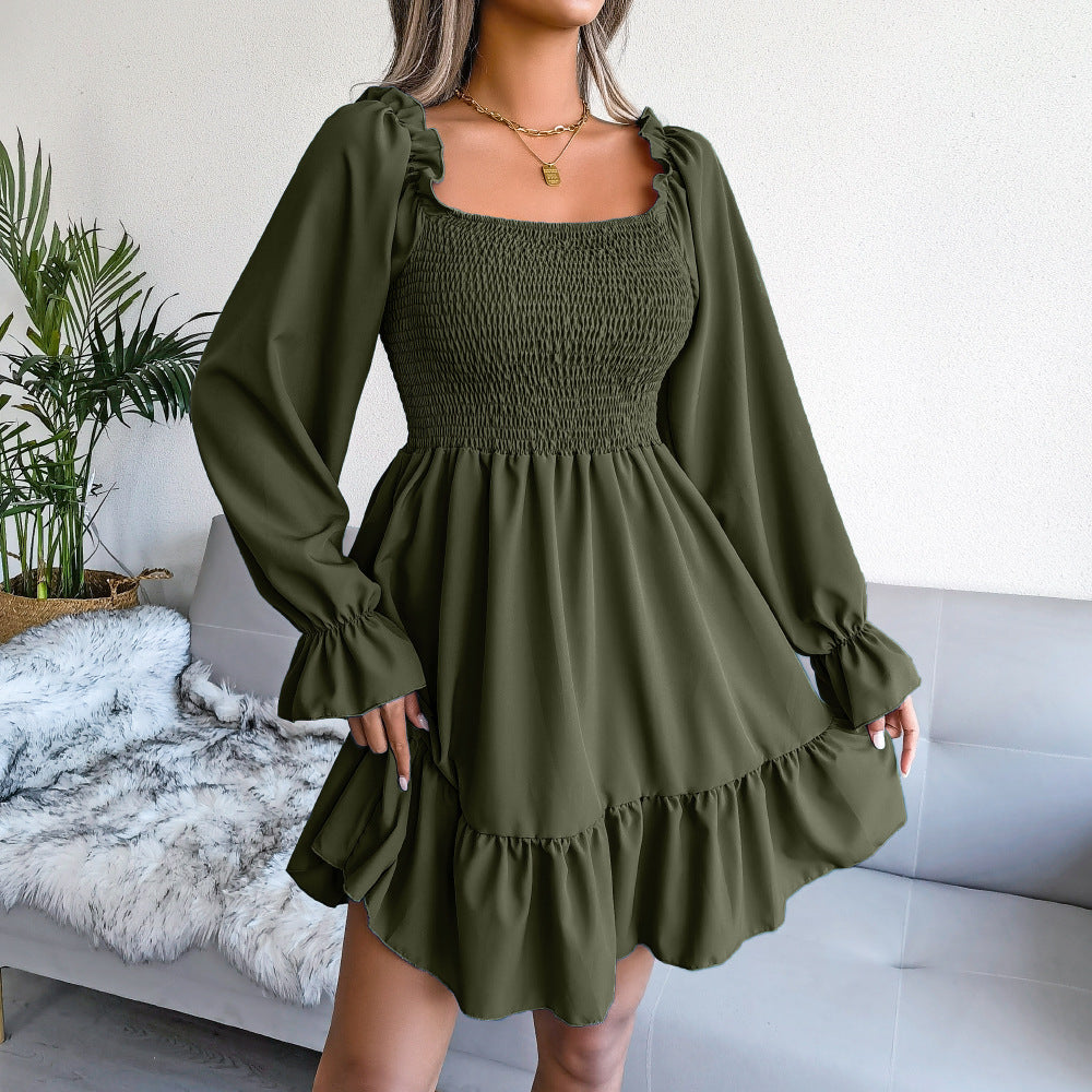 Army green square-neck ruffle swing dress with long puff sleeves and tiered skirt.