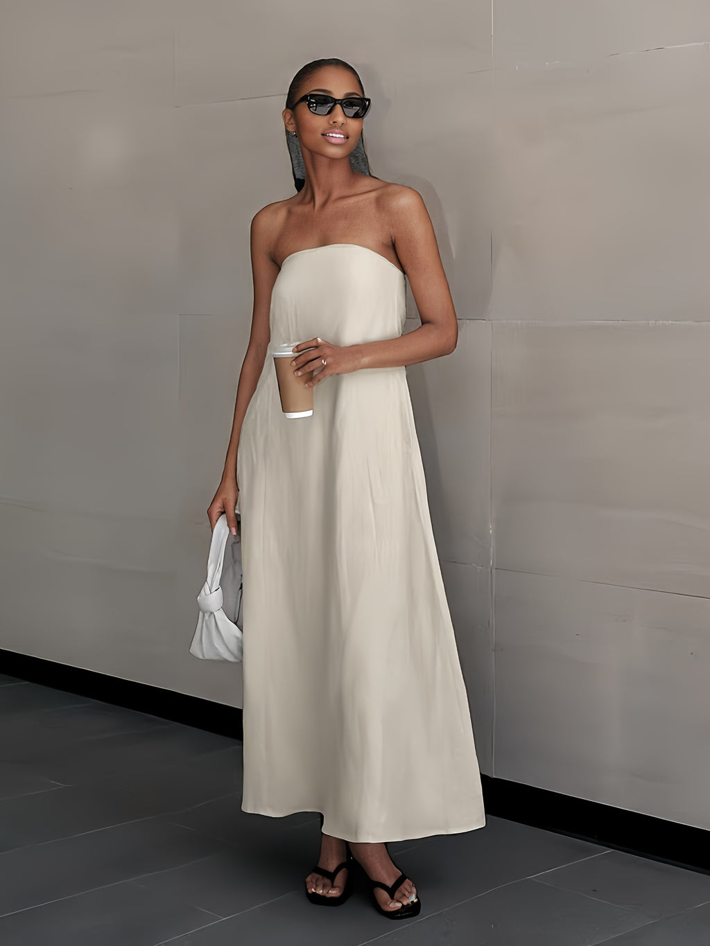 Strapless linen maxi dress in light cream, sleeveless with smooth drape
