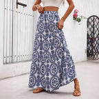 Blue patterned maxi swing skirt with circular motifs, gathered waist, flared hem