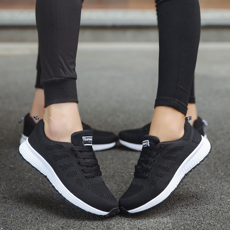 Black knit lace-up sports sneakers with white tread sole
