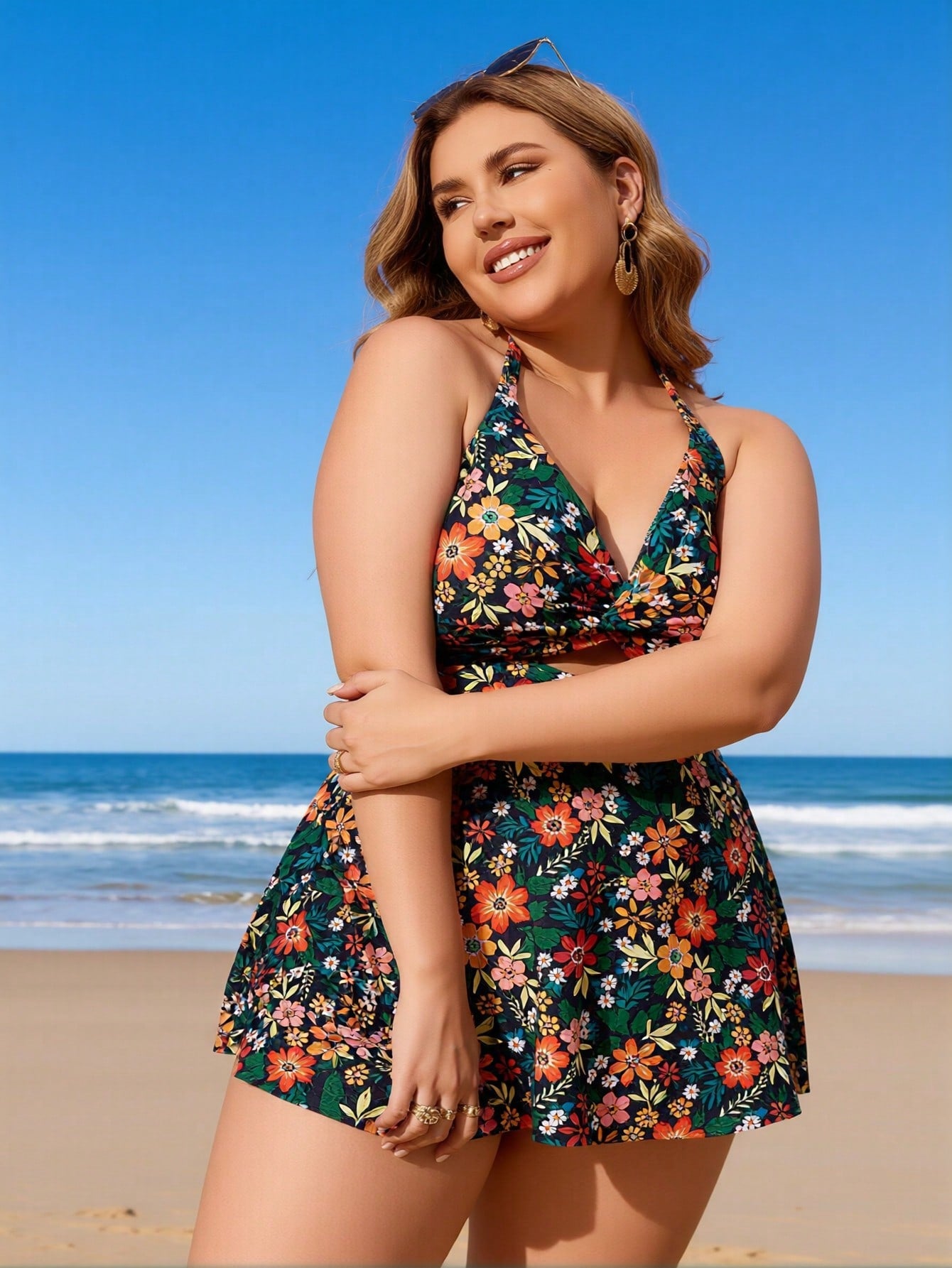 Floral halter one-piece swimdress with twist front, multicolor blooms on dark green
