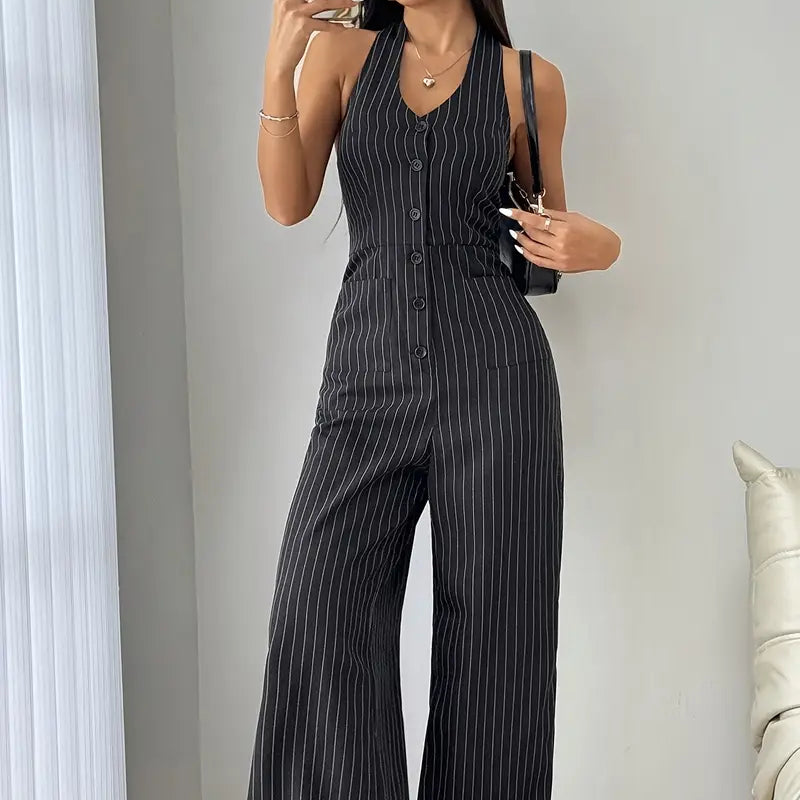 Sleeveless pinstripe jumpsuit with front buttons and wide legs, dark color