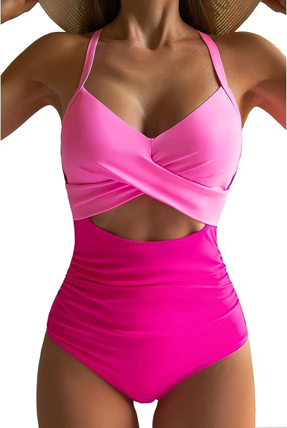 Women's cross one-piece swimsuit in vivid pink with twist front and midriff cutout