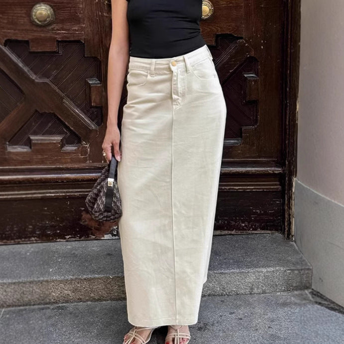 Beige high-waist denim skirt with front slit, button closure, and belt loops