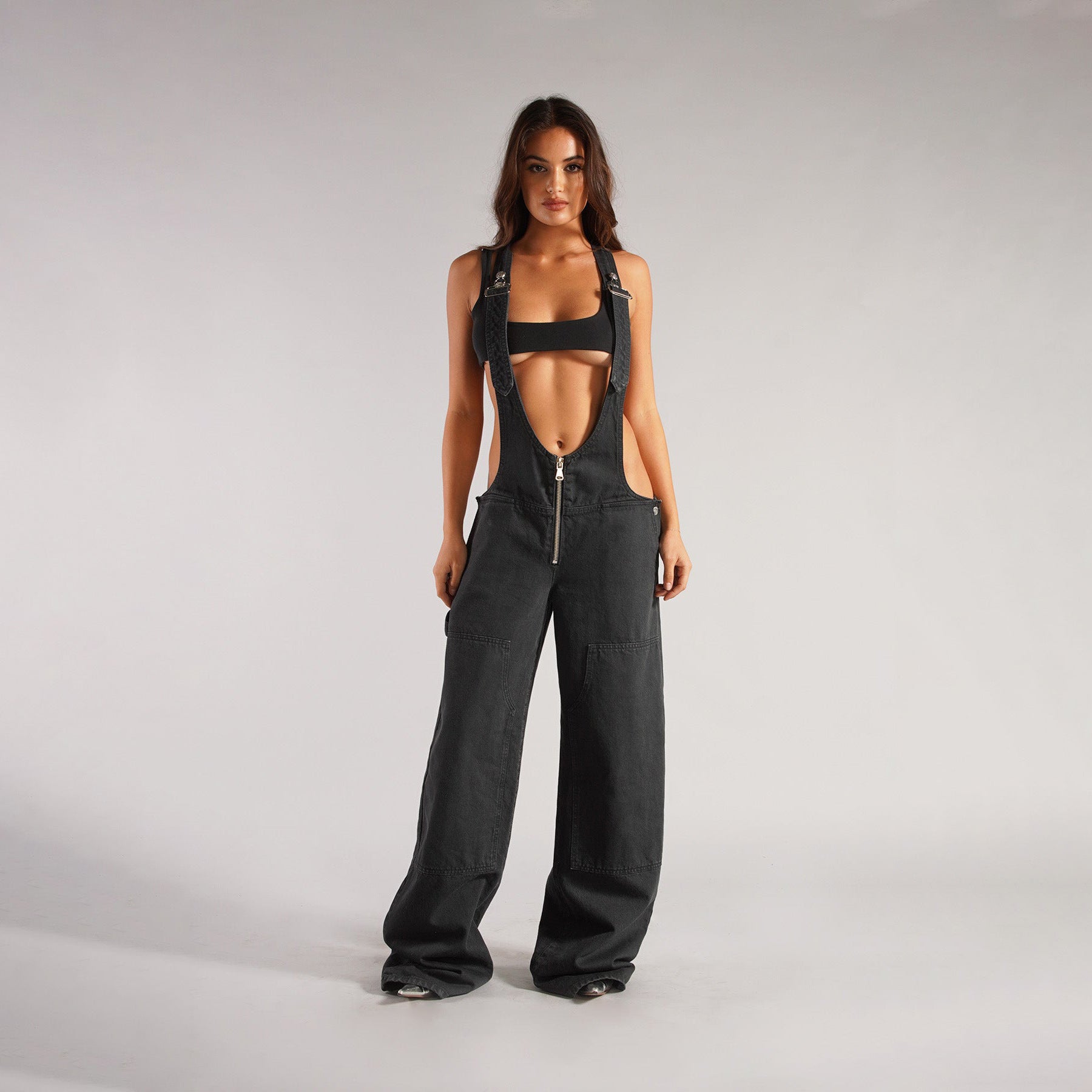 Black denim overalls with zip front, wide legs, and front pockets