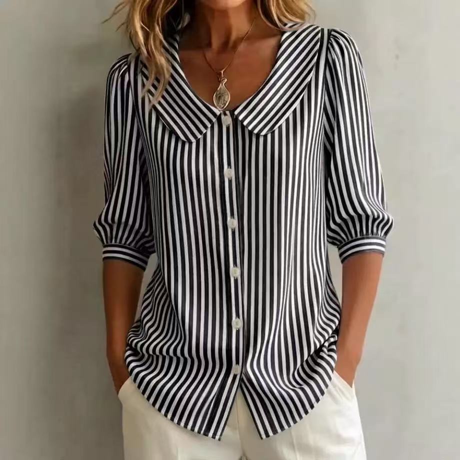 Black-and-white striped V-neck button top with pointed collar and cuffed 3/4 sleeves