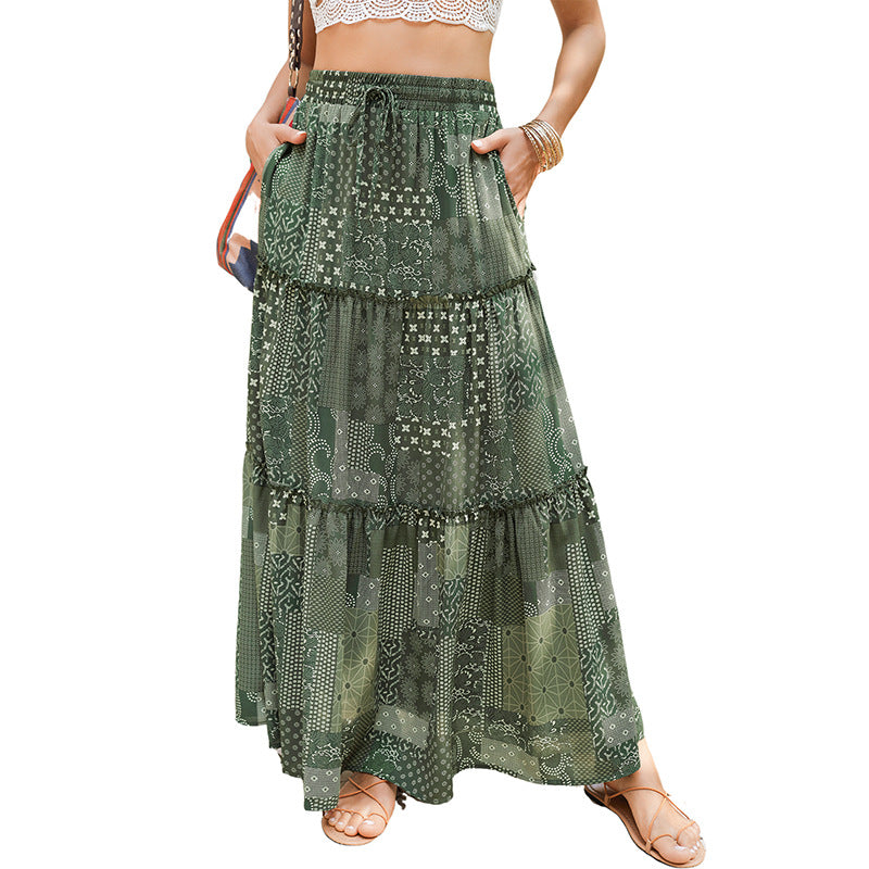 Tiered maxi dress with high waist and green patterned fabric