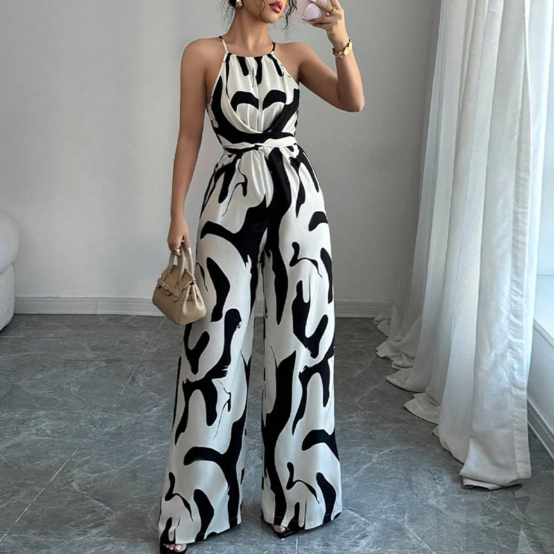 Zebra-print suspender jumpsuit, sleeveless halter, wide-leg pants, tie waist belt