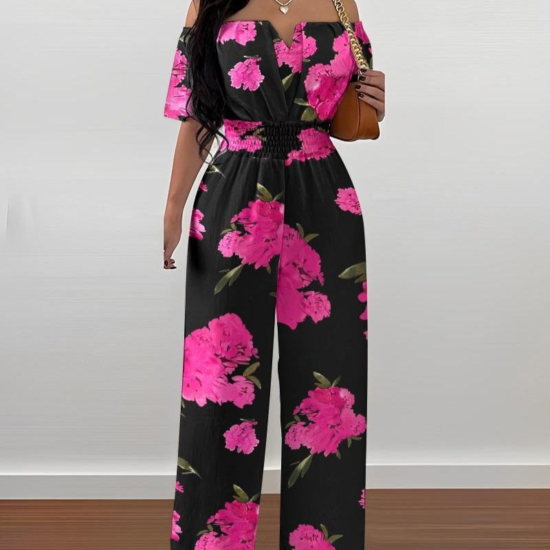 Women's floral off-shoulder jumpsuit with pink blooms on black wide-leg pants