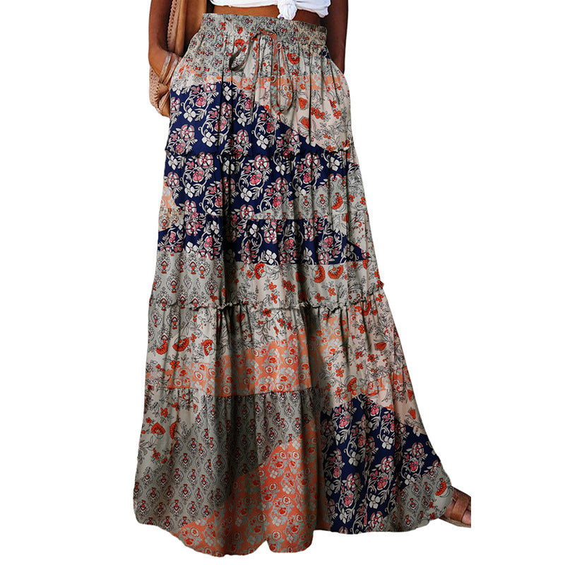 Tiered maxi dress with high waist and floral print in navy, red, and gray