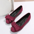 Red suede comfort loafers with fabric bow on toe
