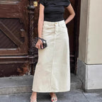 Beige high-waist denim midi skirt with front slit, button closure, and pockets